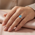 Sky blue topaz ring worn on hand