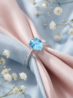 Sky blue topaz ring on silk