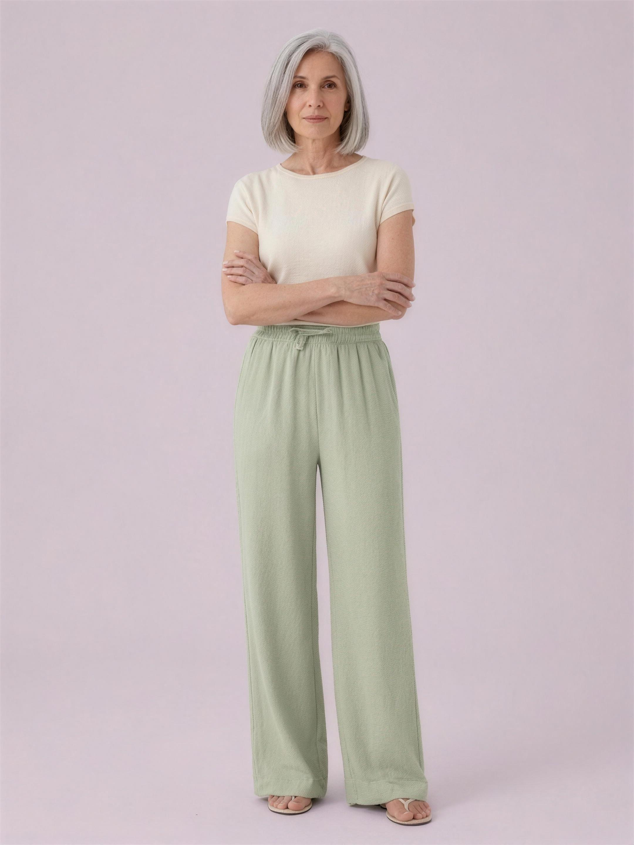 Wide-leg trousers light green studio
