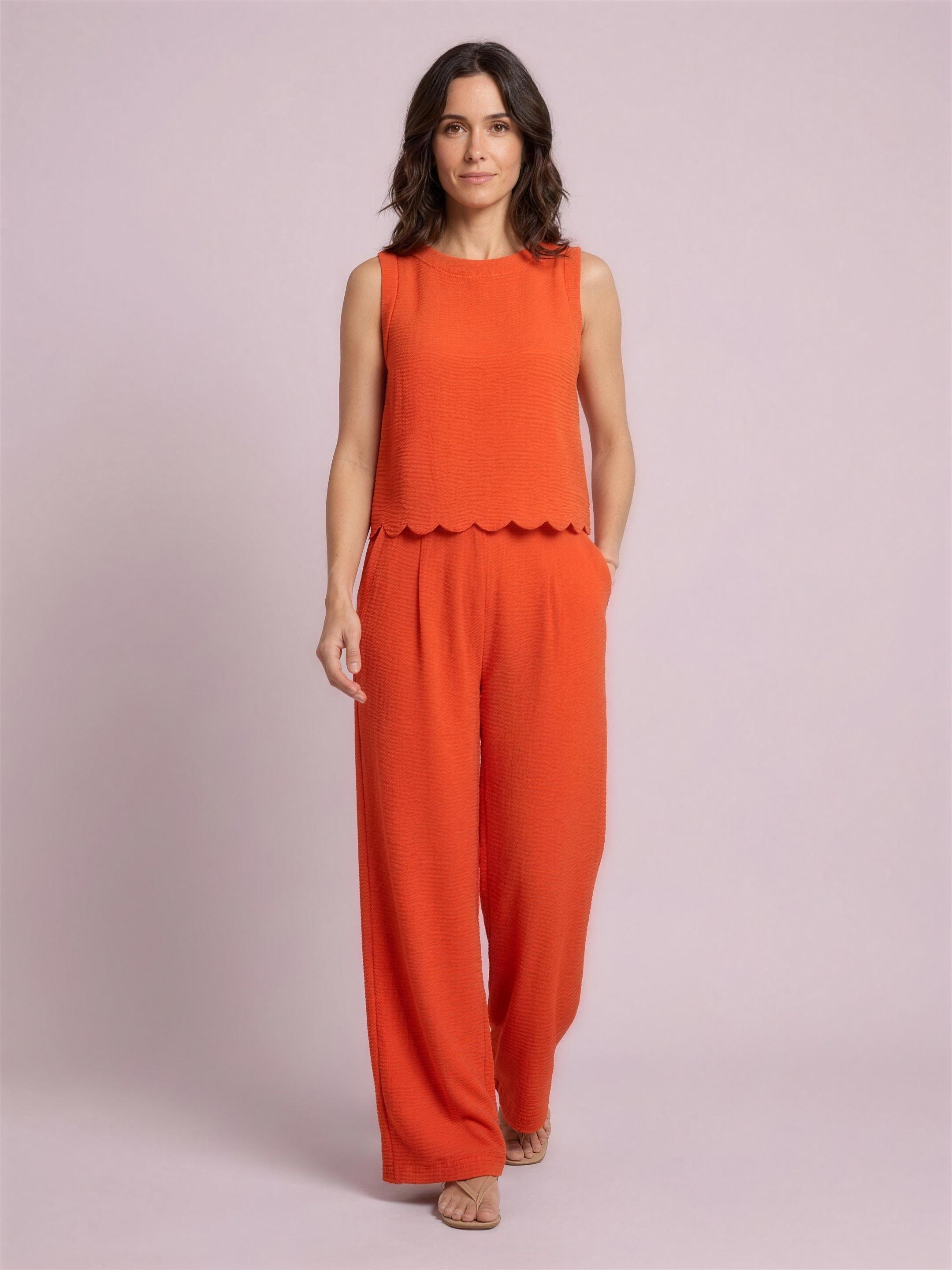 Vest and trousers set orange studio