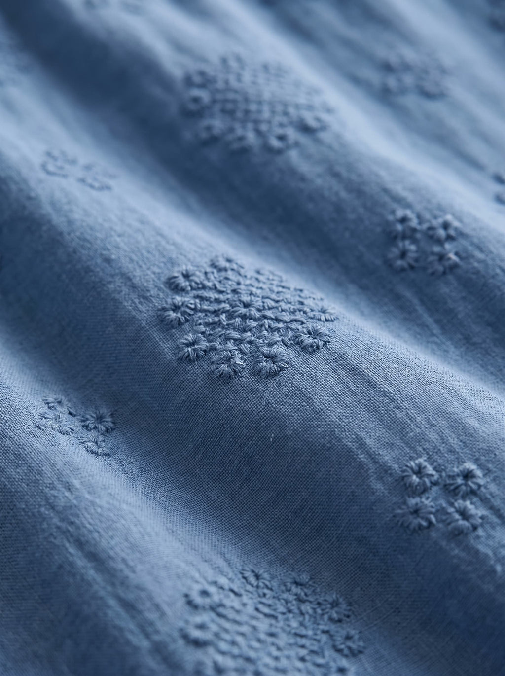 Vega vestido azul texturizado, detalle del tejido