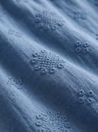 Vega vestido azul texturizado, detalle del tejido