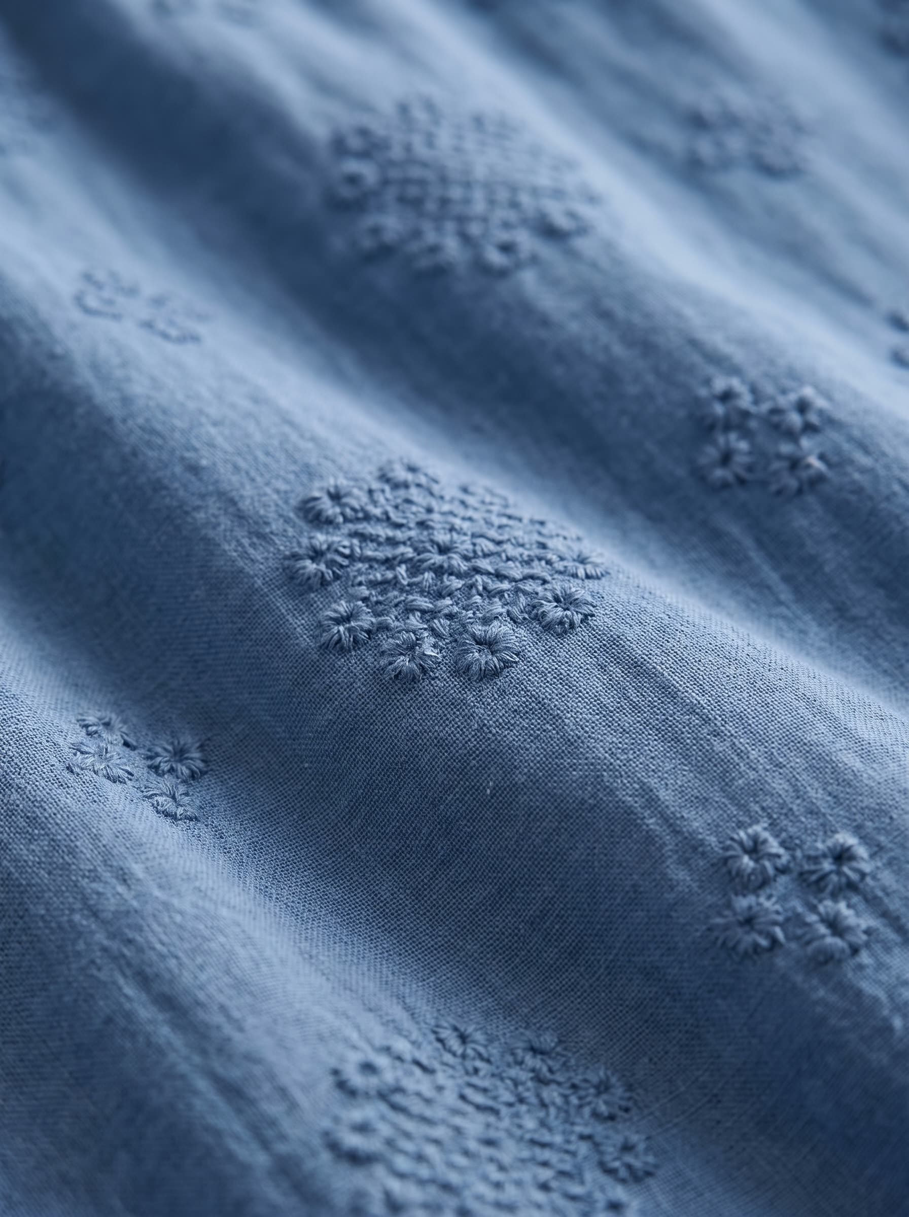 Vega vestido azul texturizado, detalle del tejido